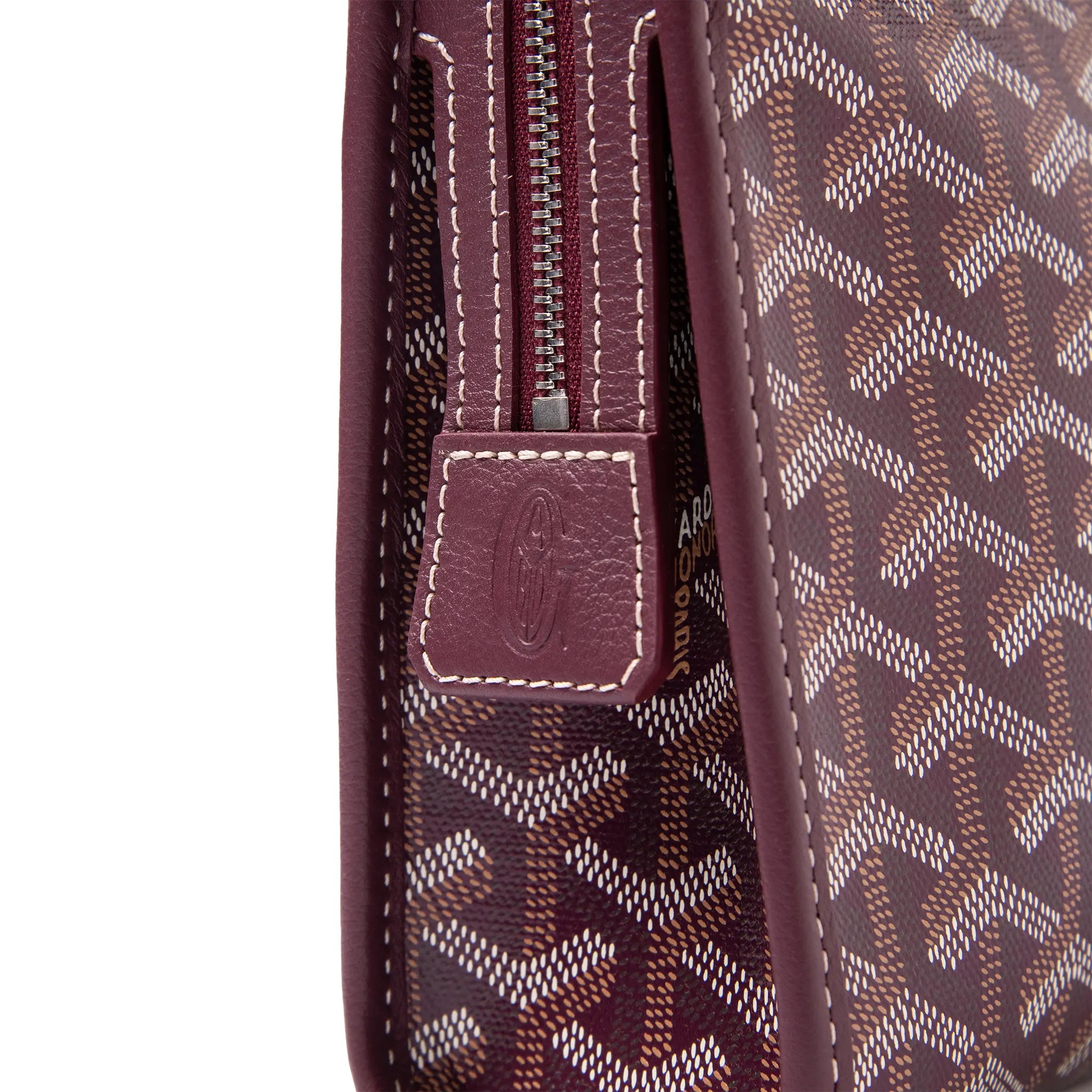 Side View of Goyard Jouvence MM Burgundy Washbag JOUVENMMLTY33CL33P